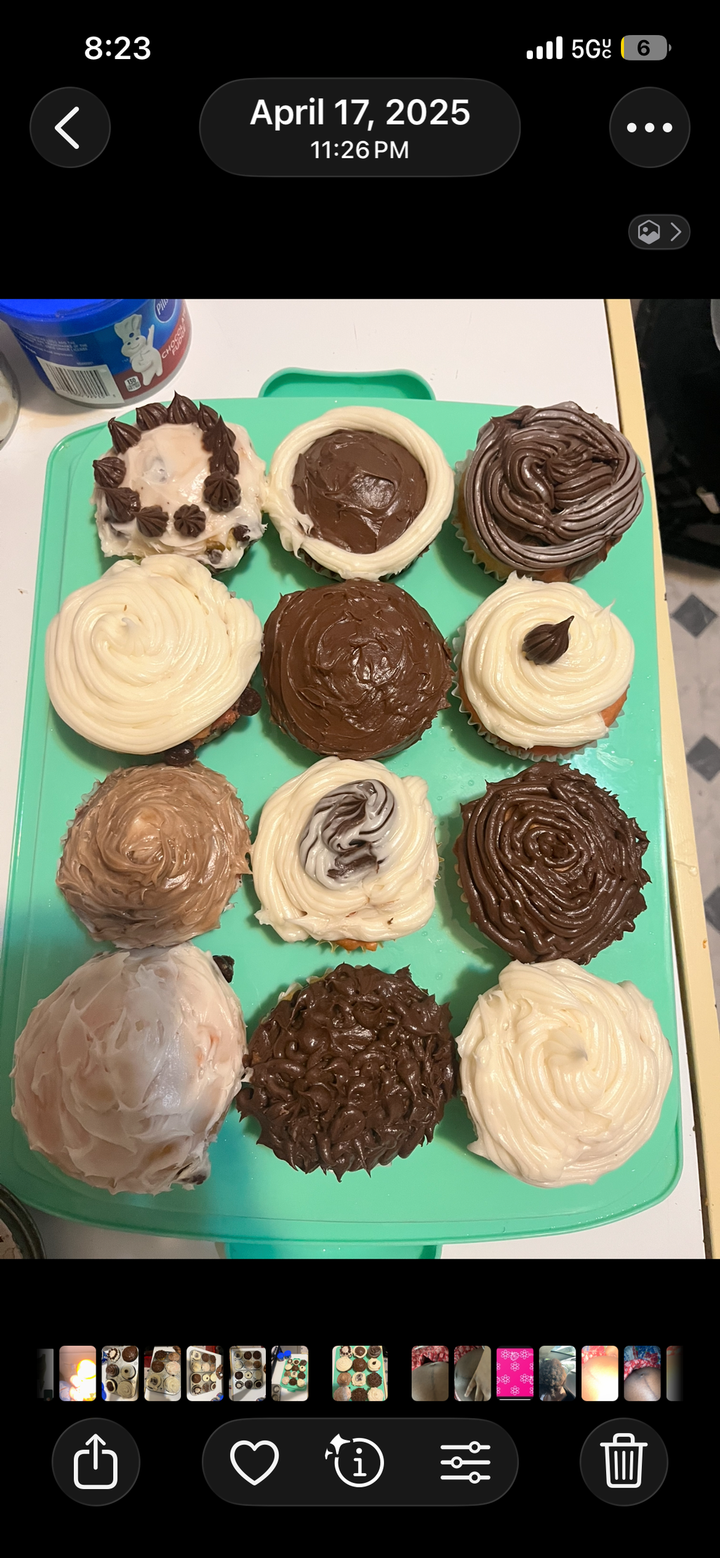 Vanilla cupcakes with white and chocolate frosting