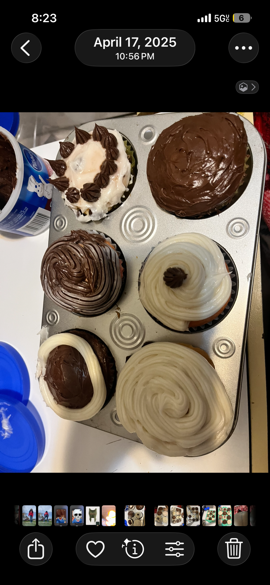 Vanilla cupcakes with white and chocolate frosting