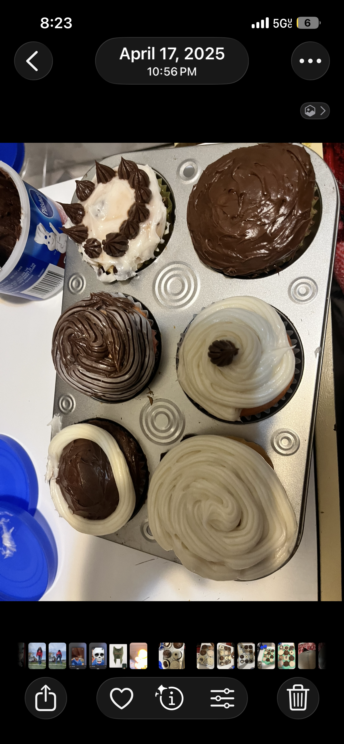 Vanilla cupcakes with white and chocolate frosting